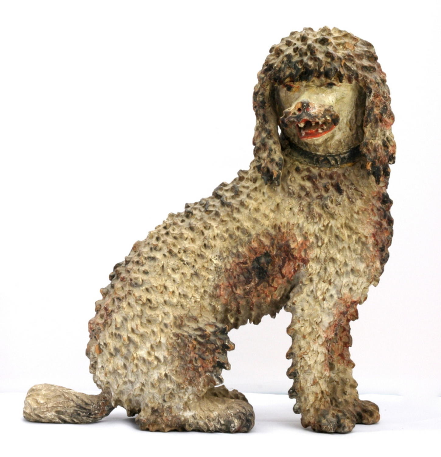 Carved wooden and painted late 18th Poodle.