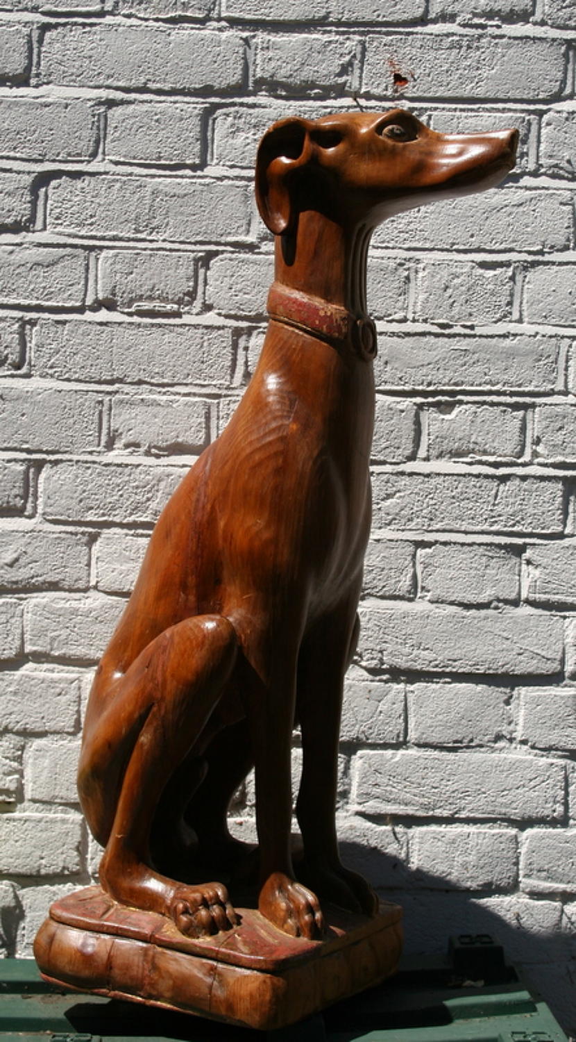 Life sized carved wooden dog