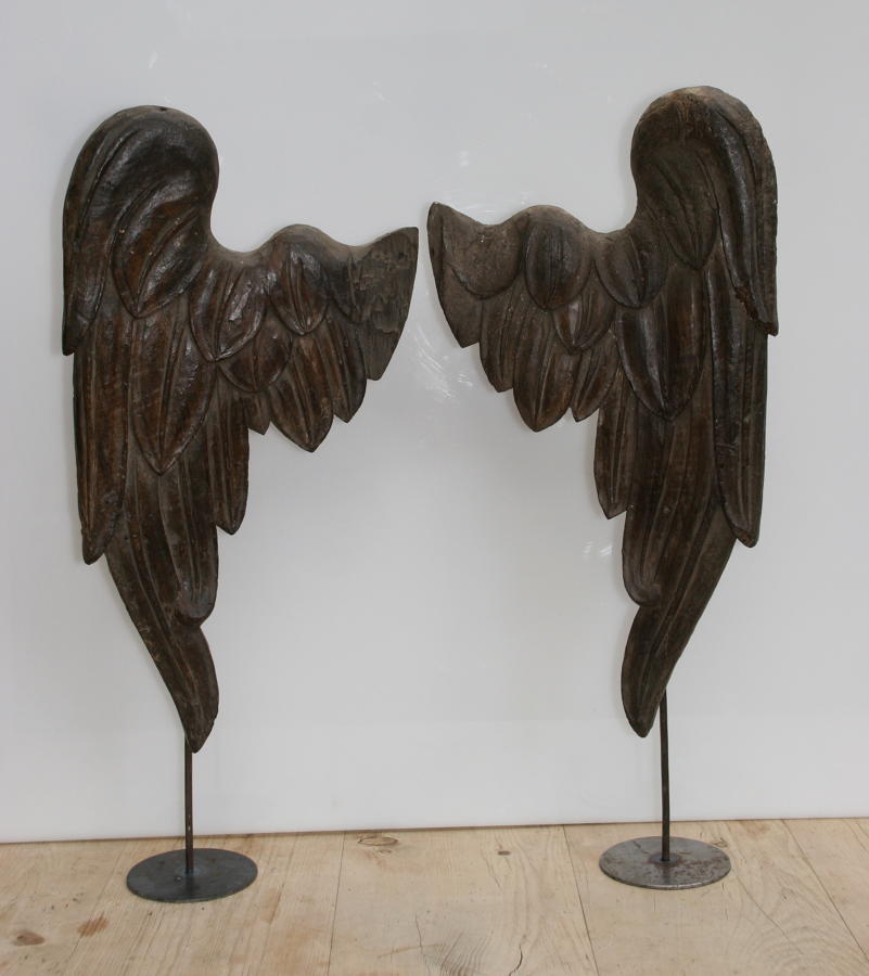 A pair of carved wooden Angels wings  19th century