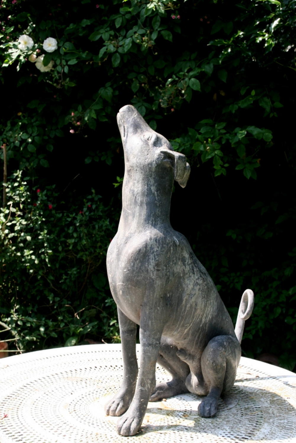 Life sized 1920's Lead dog sculpture.