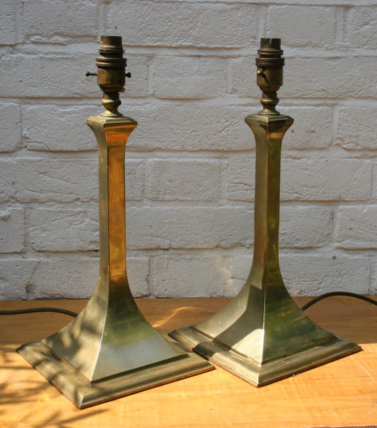 A Pair of Brass Lamps