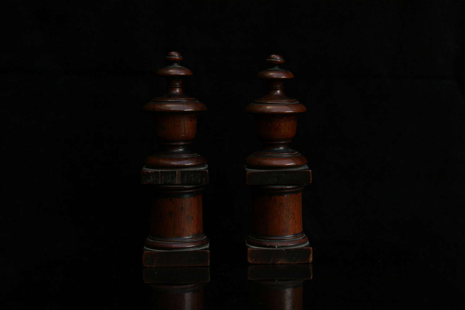 A pair of 19th century decorative wooden chimney ornaments